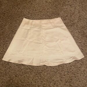 Amazon size M cream satin sleek mini skirt worn once with slip under